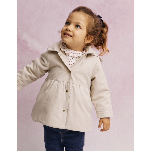 Beige padded parka with removable hood for baby girls.